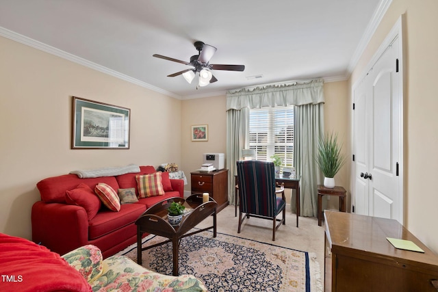 living area featuring a ceiling fan and crown molding