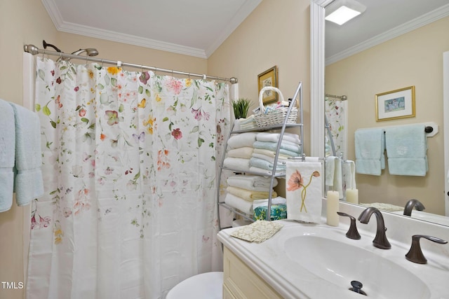 full bathroom with crown molding, vanity, and toilet