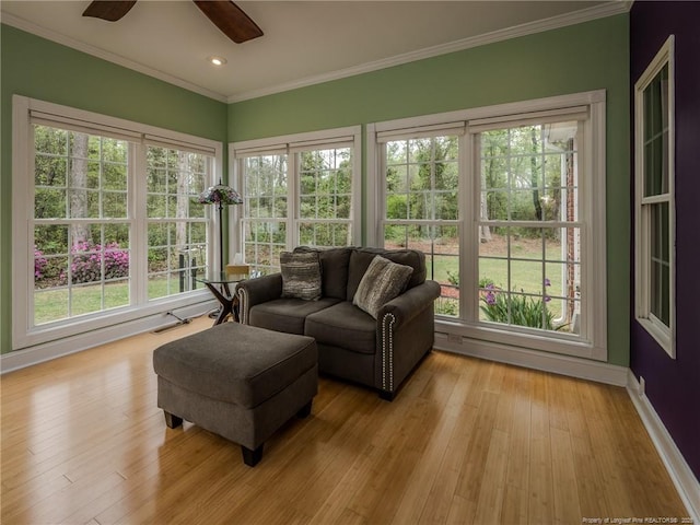 sunroom / solarium featuring crown molding, french doors, and a healthy amount of sunlight