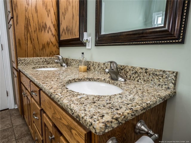 bathroom with double vanity and a sink