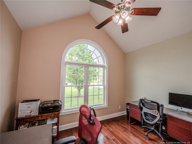 home office featuring wood finished floors, a ceiling fan, lofted ceiling, and a wealth of natural light