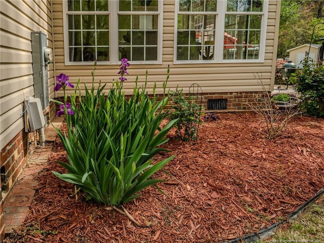 view of side of property featuring crawl space