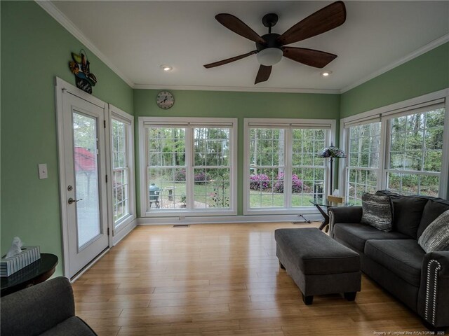 49 Alyssa Ct, Lumberton, NC 28360 - living area featuring healthy amount of natural light, ceiling fan, ornamental molding, light wood-type flooring, and recessed lighting