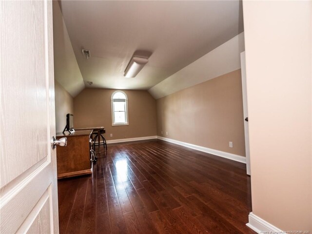 49 Alyssa Ct, Lumberton, NC 28360 - bonus room with hardwood / wood-style floors, lofted ceiling, and baseboards