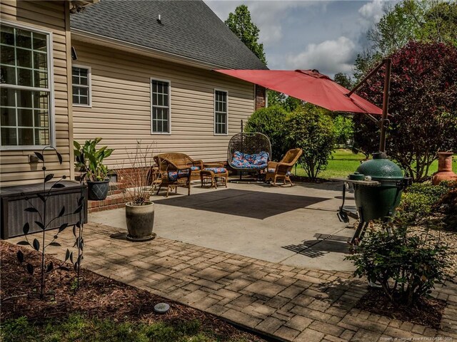 49 Alyssa Ct, Lumberton, NC 28360 - view of patio featuring an outdoor hangout area and a grill