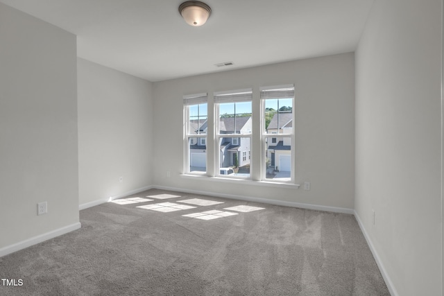 1412 Smoky Mountains St, Durham, NC 27713 - carpeted empty room with visible vents and baseboards