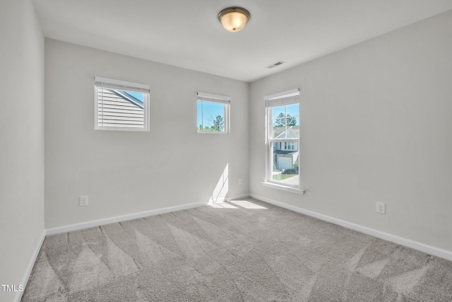 1412 Smoky Mountains St, Durham, NC 27713 - carpeted spare room featuring visible vents and baseboards