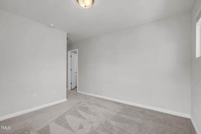 1412 Smoky Mountains St, Durham, NC 27713 - carpeted empty room featuring baseboards