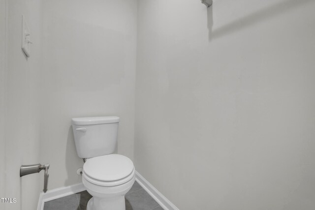 1412 Smoky Mountains St, Durham, NC 27713 - bathroom featuring tile patterned floors, baseboards, and toilet