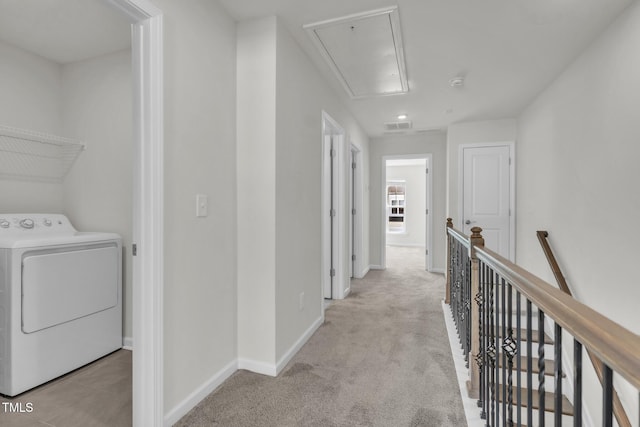 1412 Smoky Mountains St, Durham, NC 27713 - corridor with washer / clothes dryer, baseboards, visible vents, carpet floors, and attic access