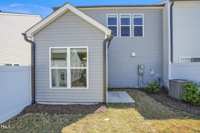1412 Smoky Mountains St, Durham, NC 27713 - back of property featuring cooling unit and fence