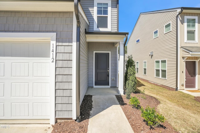 1412 Smoky Mountains St, Durham, NC 27713 - entrance to property with a lawn and a garage