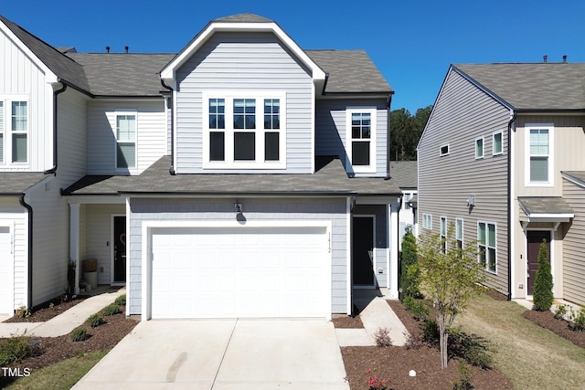1412 Smoky Mountains St, Durham, NC 27713 - view of front of home featuring concrete driveway and a garage
