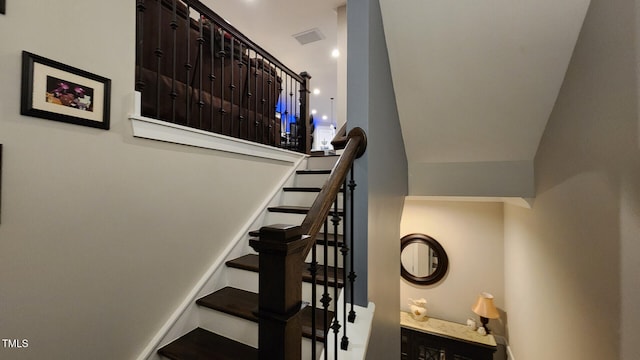 stairs featuring visible vents and recessed lighting