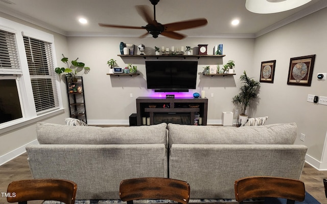 living room with baseboards, recessed lighting, ceiling fan, and wood finished floors