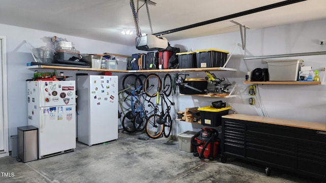 garage with freestanding refrigerator
