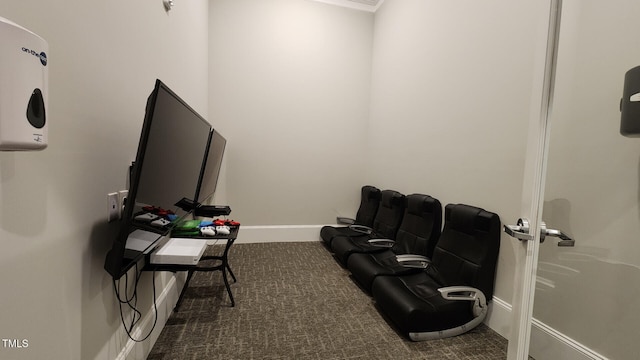 interior space with baseboards and carpet flooring