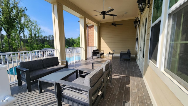 view of patio / terrace with a fenced in pool, a ceiling fan, outdoor lounge area, and visible vents