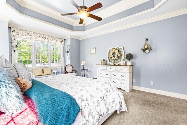 215 Terrell Dr, Rolesville, NC 27571 - carpeted bedroom with crown molding, a raised ceiling, ceiling fan, and baseboards