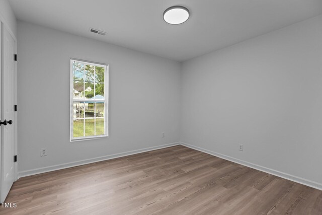 1349 Crabtree Blvd, Raleigh, NC 27610 - unfurnished room with visible vents, baseboards, and light wood-type flooring