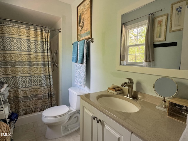 700 Sawmill Rd, Raleigh, NC 27615 - bathroom featuring tile patterned floors, vanity, a shower with shower curtain, and toilet