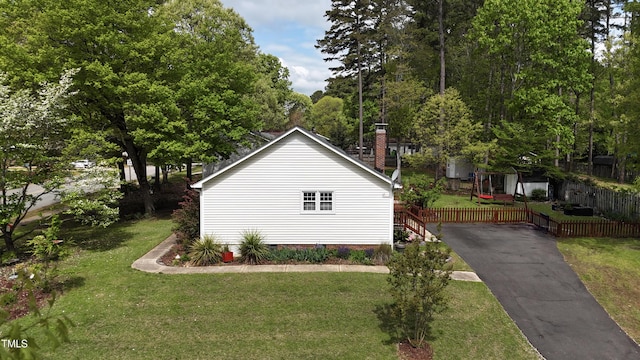 700 Sawmill Rd, Raleigh, NC 27615 - view of home's exterior featuring a yard