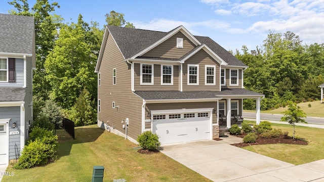 3700 Horton Hill Dr, New Hill, NC 27562 - view of front of property featuring a garage, a front yard, concrete driveway, and roof with shingles