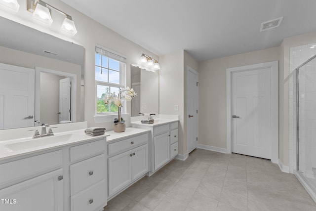 3700 Horton Hill Dr, New Hill, NC 27562 - full bathroom featuring a shower stall, baseboards, vanity, and tile patterned flooring