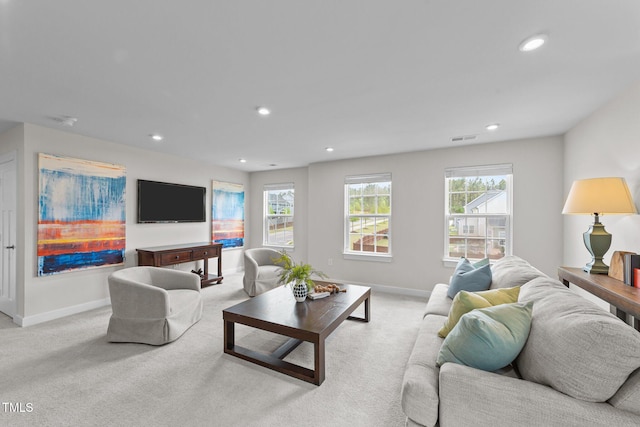 3700 Horton Hill Dr, New Hill, NC 27562 - living area with light colored carpet, baseboards, and recessed lighting