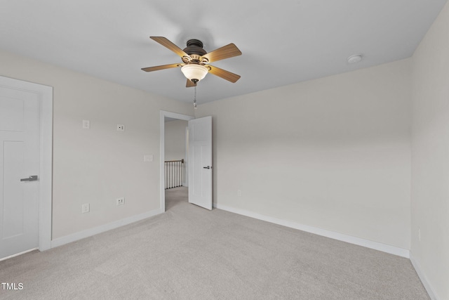 3700 Horton Hill Dr, New Hill, NC 27562 - spare room with light colored carpet, a ceiling fan, and baseboards
