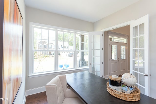 205 Riverine Dr, Pittsboro, NC 27312 - dining space with dark wood-type flooring, french doors, and baseboards