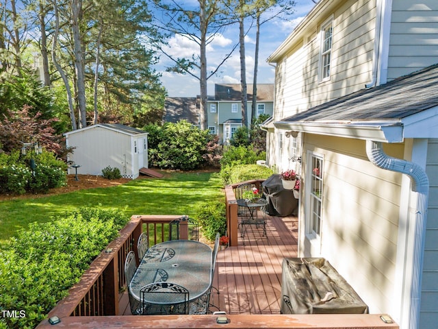 wooden terrace with an outdoor structure, outdoor dining area, a lawn, and a shed