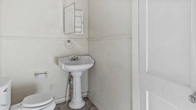 905 David St, Henderson, NC 27536 - bathroom featuring a sink and toilet