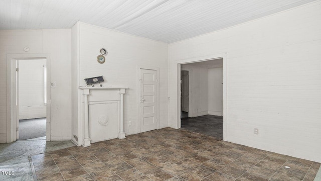 905 David St, Henderson, NC 27536 - unfurnished living room with stone finish flooring