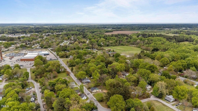 905 David St, Henderson, NC 27536 - drone / aerial view featuring a forest view