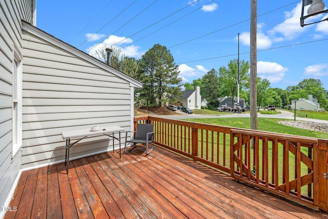 deck featuring a yard