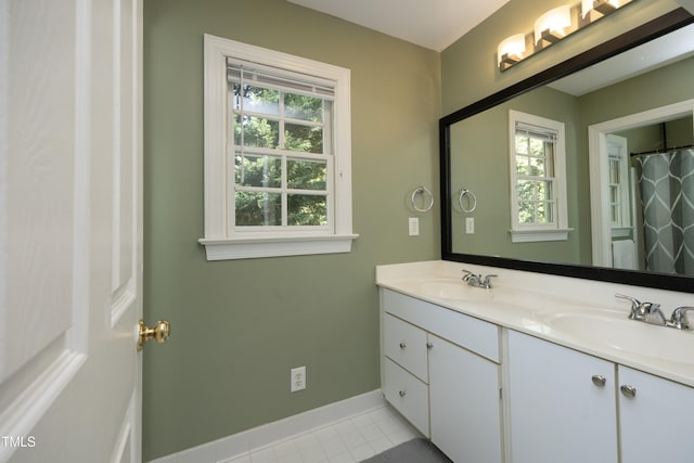 221 Ironwoods Dr, Chapel Hill, NC 27516 - full bathroom featuring tile patterned flooring, a wealth of natural light, and a sink