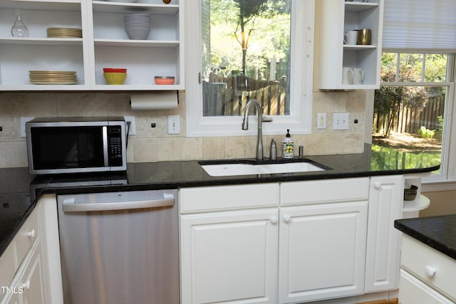 221 Ironwoods Dr, Chapel Hill, NC 27516 - kitchen featuring open shelves, stainless steel appliances, a sink, and white cabinetry