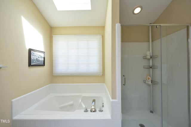 221 Ironwoods Dr, Chapel Hill, NC 27516 - full bathroom featuring a shower stall, a garden tub, and a skylight