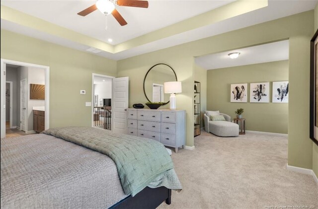 1616 Elk Run Dr, Fayetteville, NC 28312 - bedroom with a raised ceiling, light carpet, ceiling fan, and baseboards