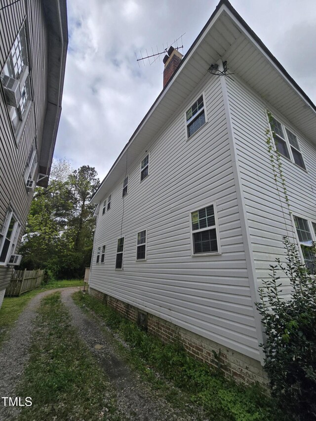 827 Sunset Ave, Rocky Mount, NC 27804 - view of side of home featuring a chimney