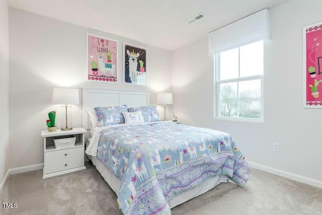 363 Tormore Dr, Sanford, NC 27330 - bedroom featuring baseboards, visible vents, and carpet floors