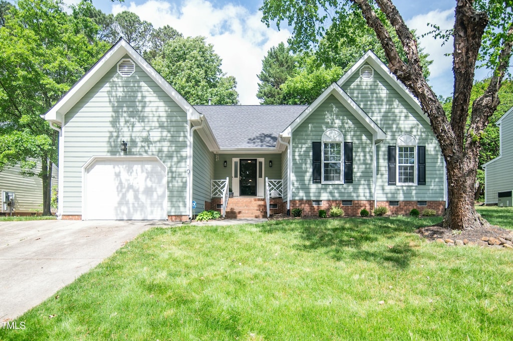 101 Lakeshore Dr Drive, Durham, NC 27713 - ranch-style home featuring roof with shingles, a front lawn, concrete driveway, a garage, and crawl space