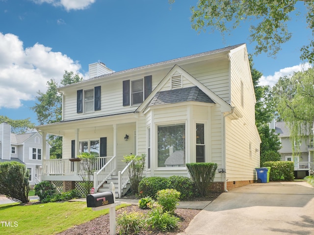3303 Glen Currin Dr, Raleigh, NC 27612 - view of front of property with covered porch, stairway, a chimney, and driveway