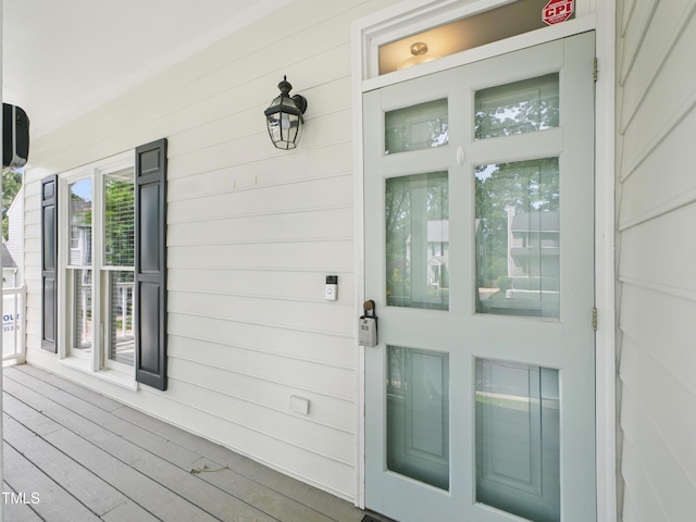 3303 Glen Currin Dr, Raleigh, NC 27612 - view of exterior entry with a porch