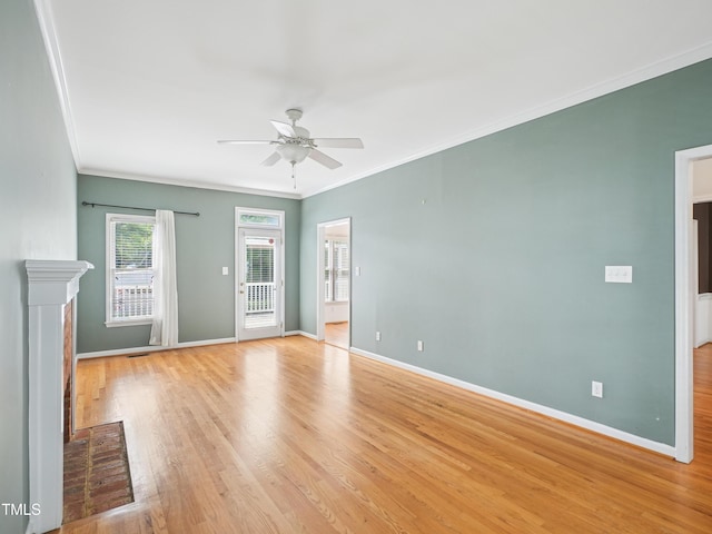 3303 Glen Currin Dr, Raleigh, NC 27612 - unfurnished living room featuring a ceiling fan, baseboards, ornamental molding, and light wood-type flooring