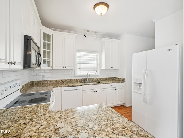 3303 Glen Currin Dr, Raleigh, NC 27612 - kitchen featuring white appliances, a sink, backsplash, crown molding, and white cabinets