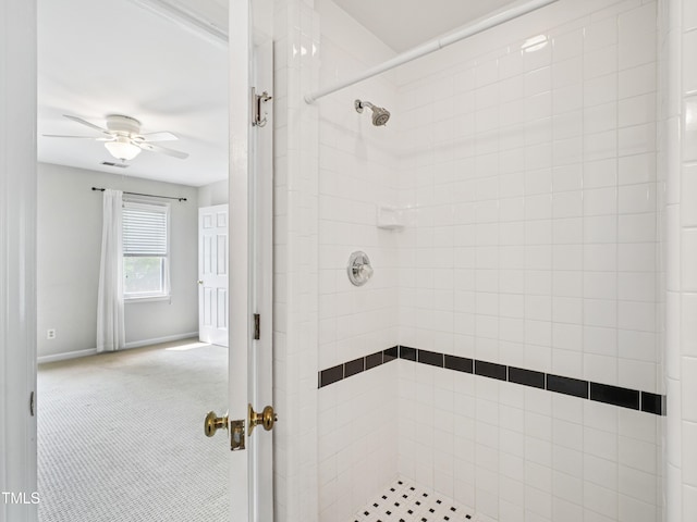 3303 Glen Currin Dr, Raleigh, NC 27612 - full bathroom with a tile shower, a ceiling fan, and baseboards