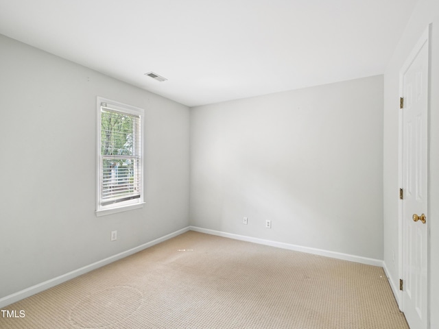 3303 Glen Currin Dr, Raleigh, NC 27612 - unfurnished room with light carpet and baseboards
