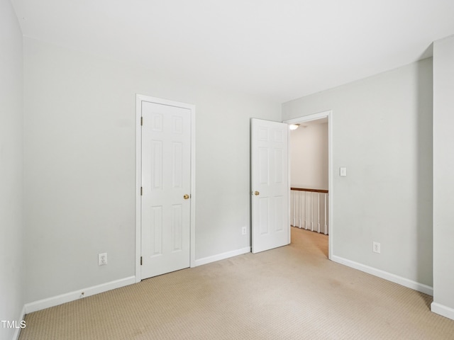 3303 Glen Currin Dr, Raleigh, NC 27612 - unfurnished bedroom featuring carpet and baseboards